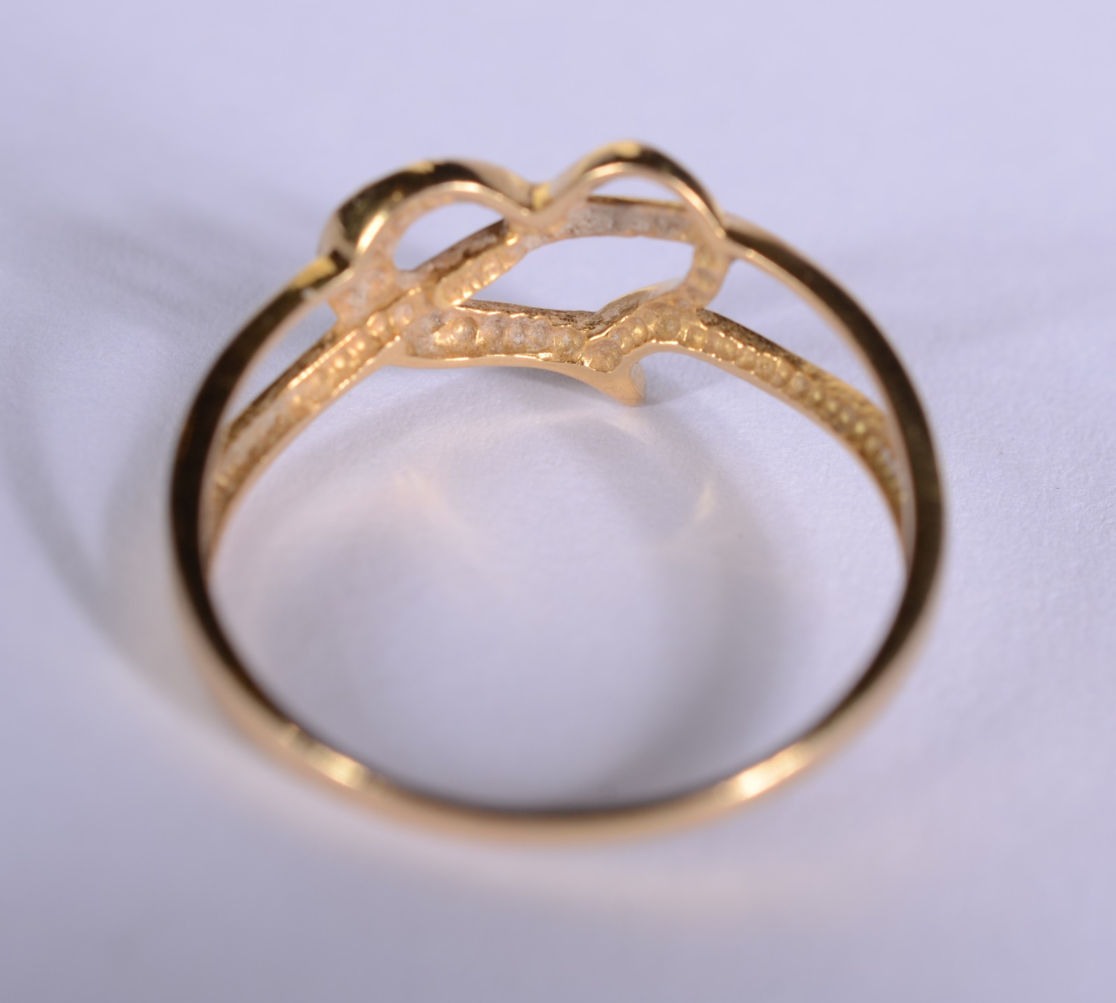 Anel de ouro 18 k., contraste 750 mls na forma de coração, aro 22... - foto 4 de 7