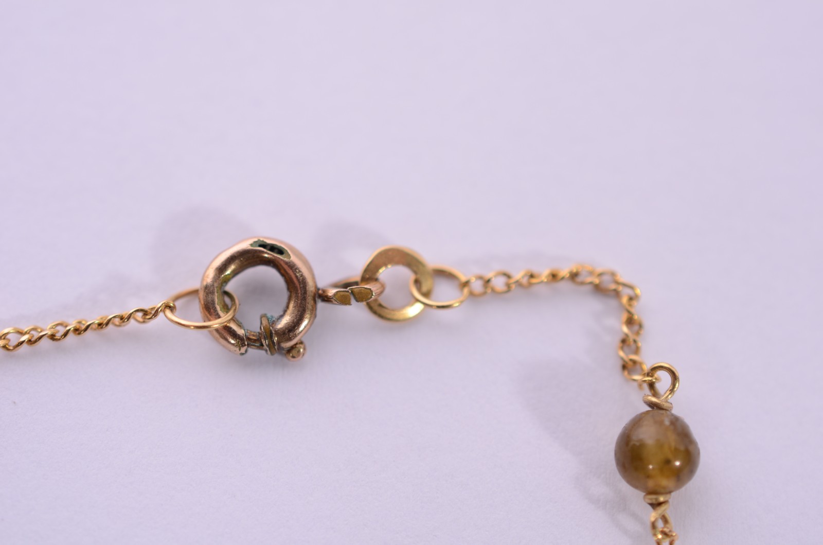 Pulseira de ouro 18 k., com pedras verdes. (Por motivos de segurança... - foto 6 de 7
