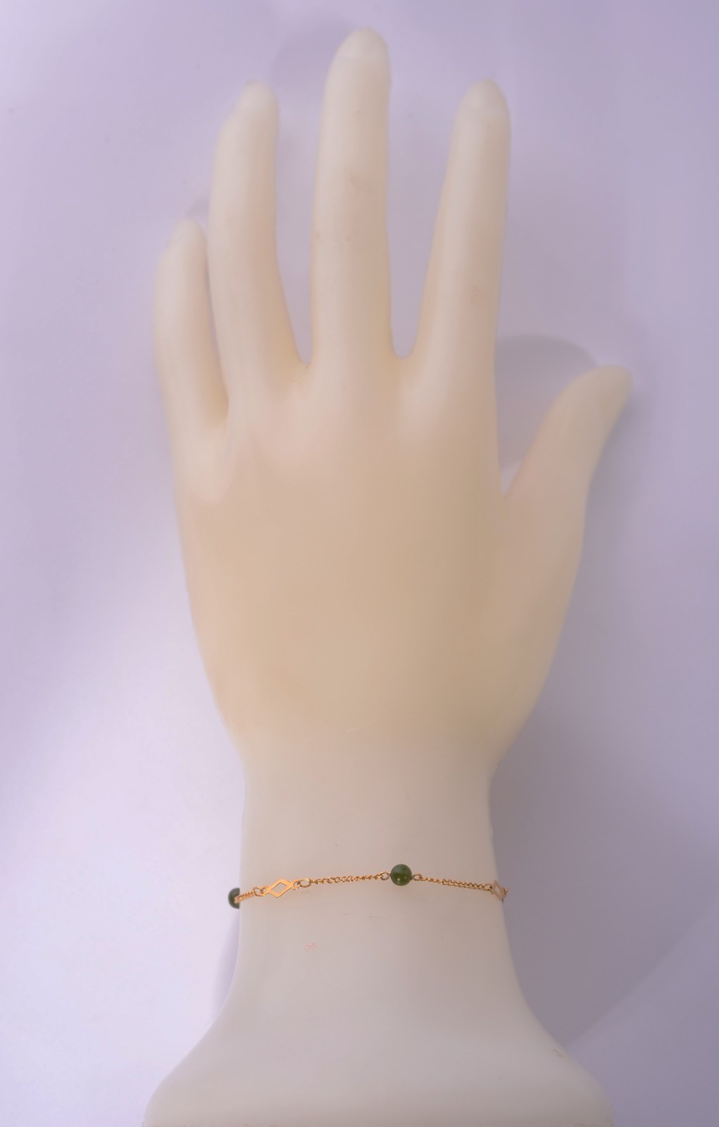 Pulseira de ouro 18 k., com pedras verdes. (Por motivos de segurança... - foto 7 de 7