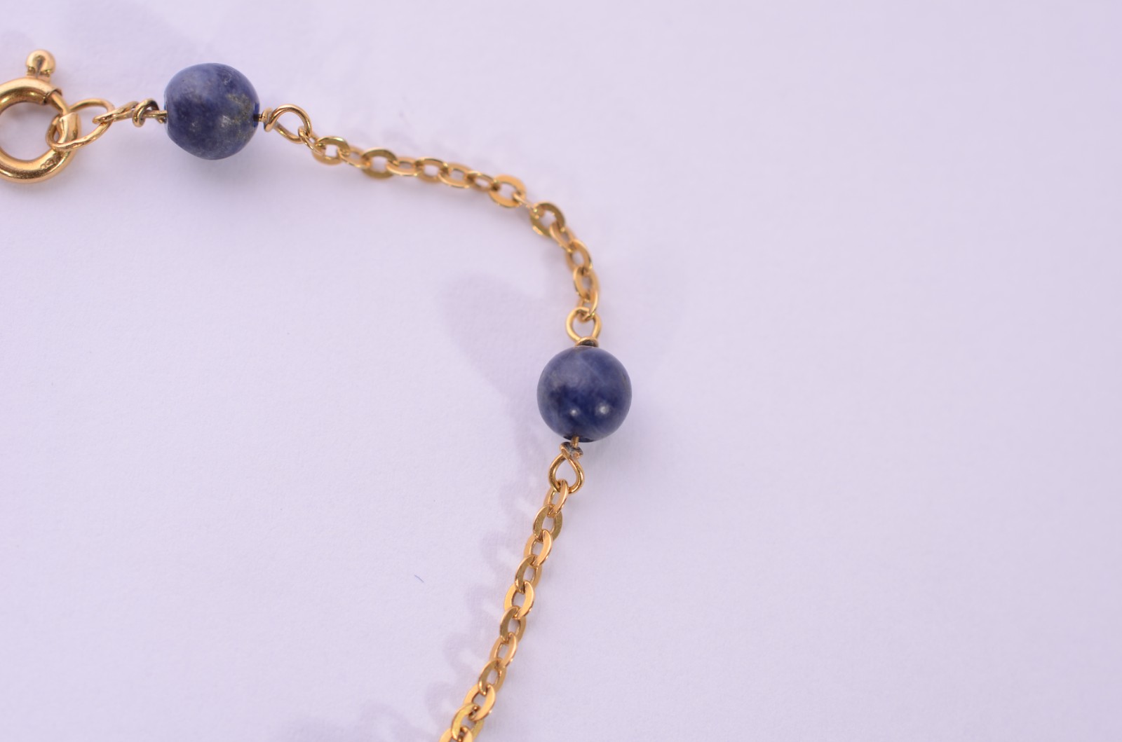 Pulseira de ouro 18 k., com pedras azuis. (Por motivos de segurança a... - foto 3 de 5