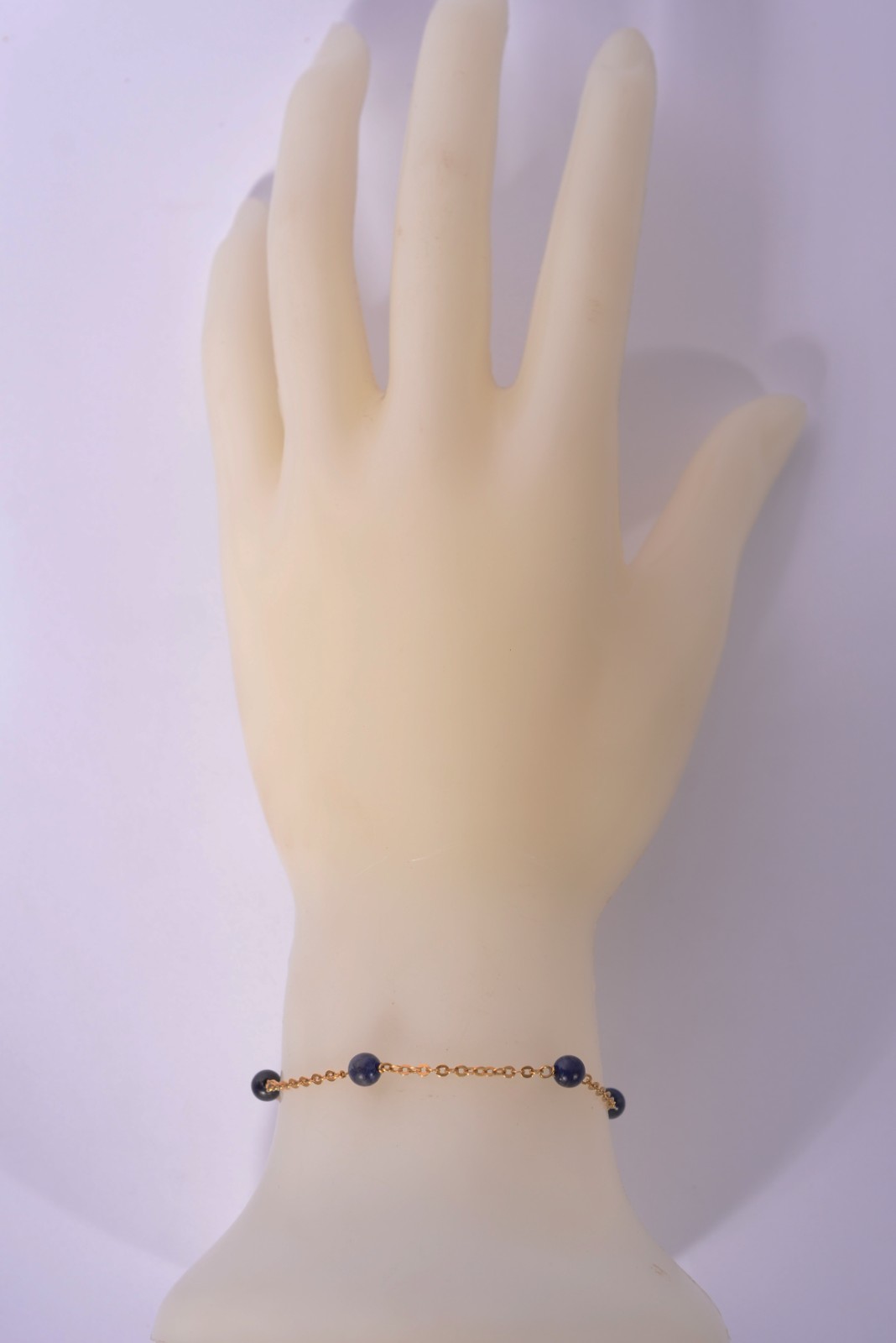 Pulseira de ouro 18 k., com pedras azuis. (Por motivos de segurança a... - foto 5 de 5