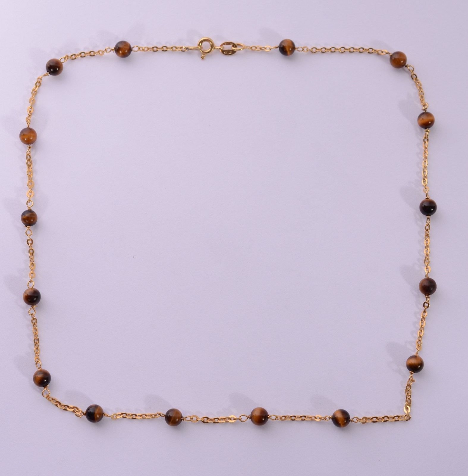 Colar de ouro 18 k., com pedras "olho de tigre". (Por motivos de... - foto 2 de 7