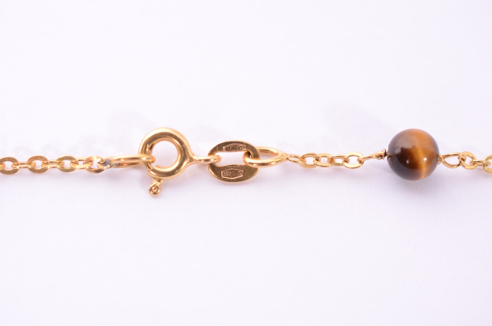 Colar de ouro 18 k., com pedras "olho de tigre". (Por motivos de... - foto 4 de 7