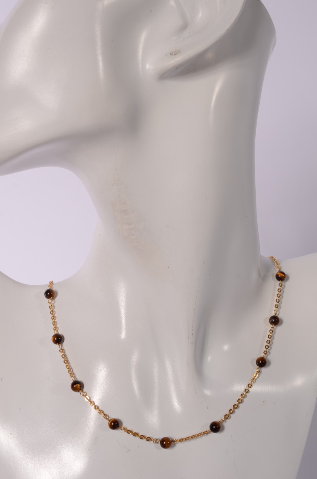 Colar de ouro 18 k., com pedras "olho de tigre". (Por motivos de... - foto 6 de 7