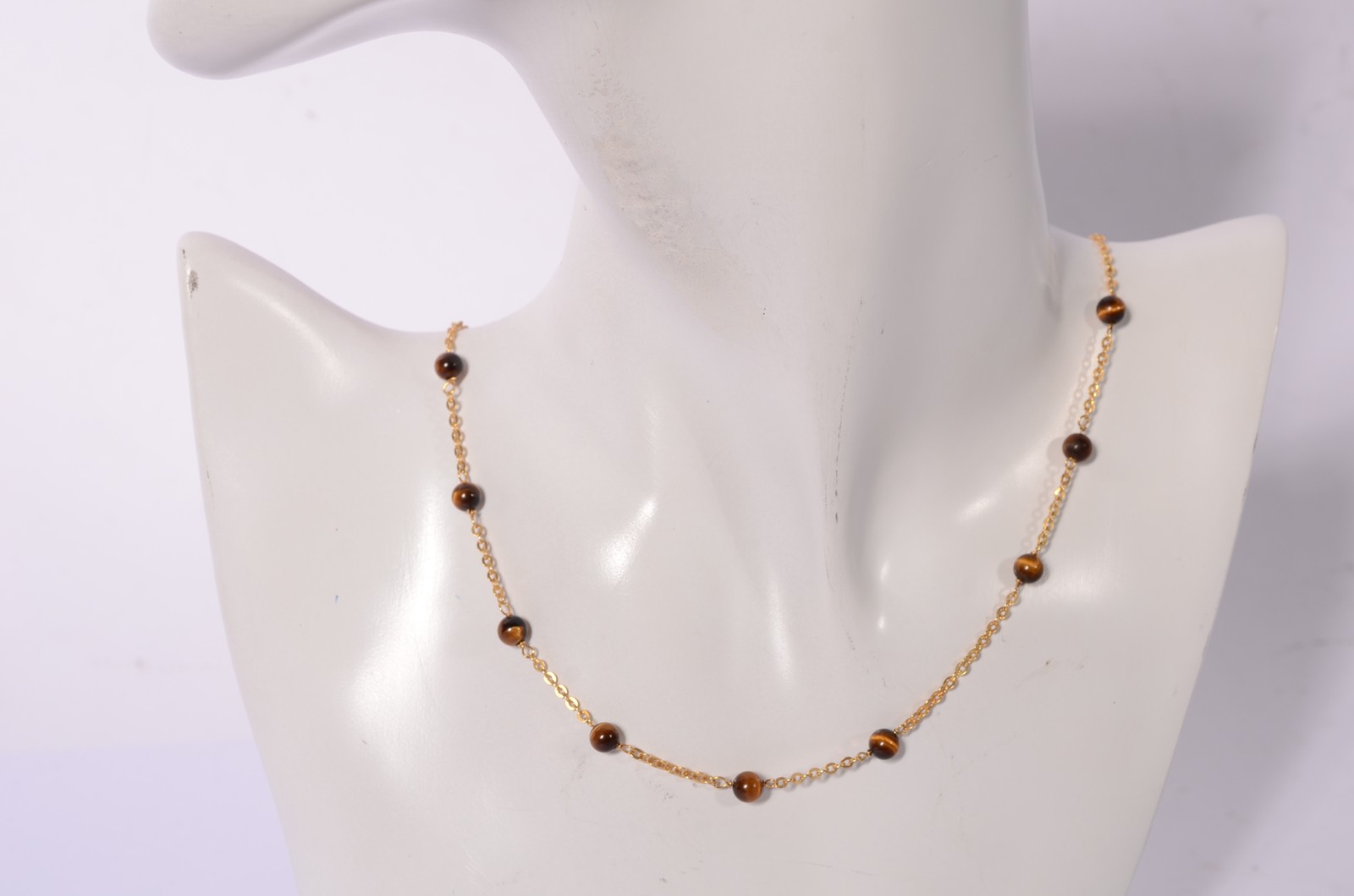 Colar de ouro 18 k., com pedras "olho de tigre". (Por motivos de... - foto 7 de 7
