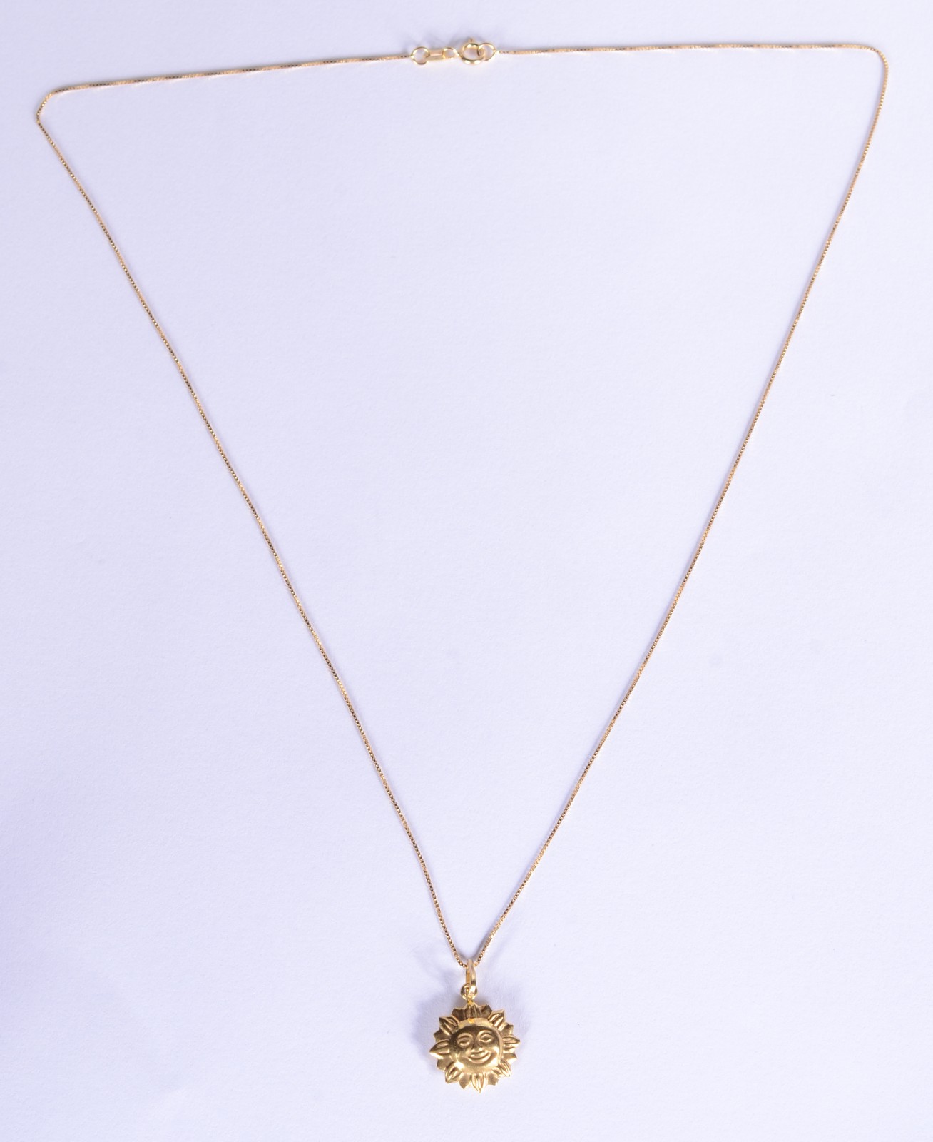 Colar de ouro 18 k., contraste 750 mls com pendente. (Por motivos de... - foto 2 de 6