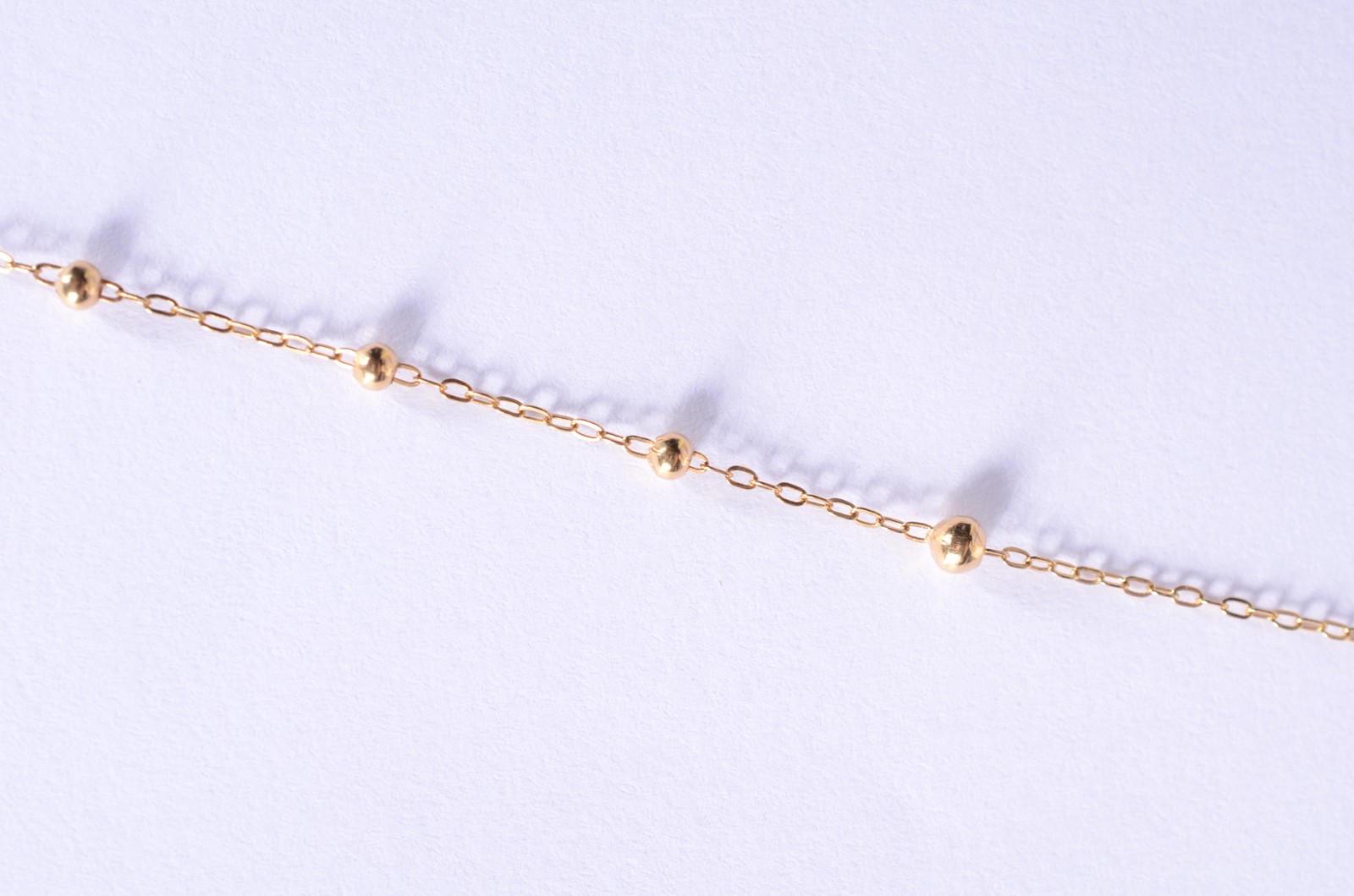 Colar na forma de terço com bolinhas de ouro 18 k., contraste 750... - foto 5 de 8