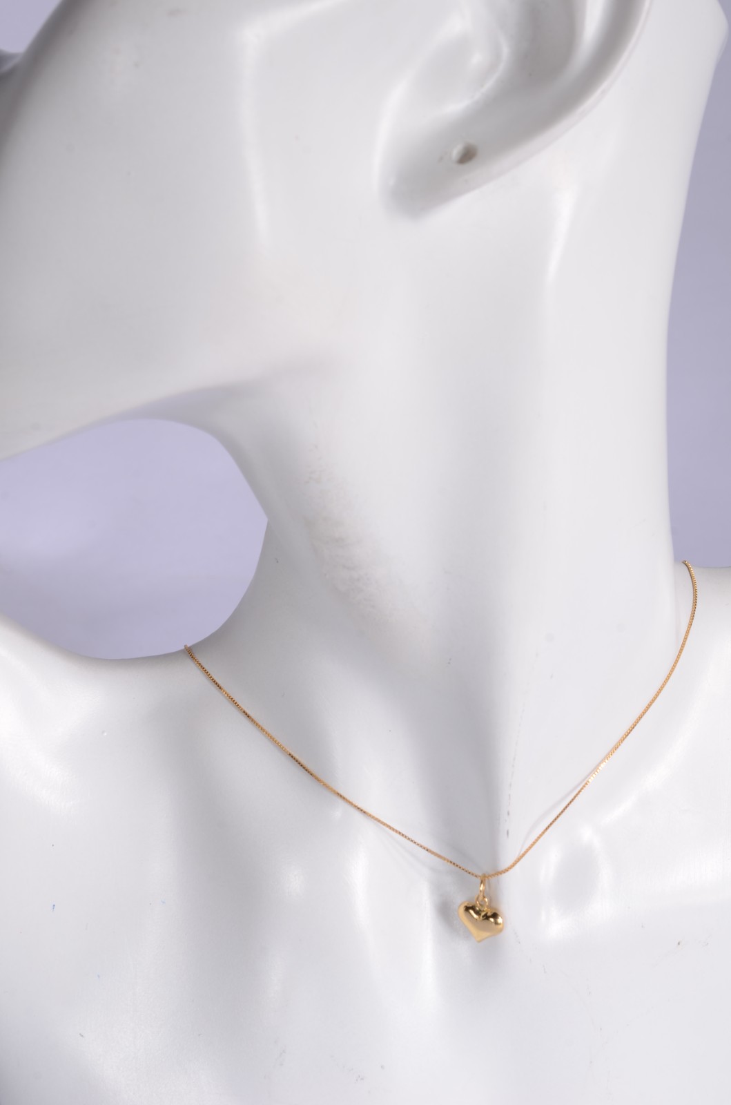 Colar com pendente na forma de coração de ouro 18k., contraste 750... - foto 5 de 5