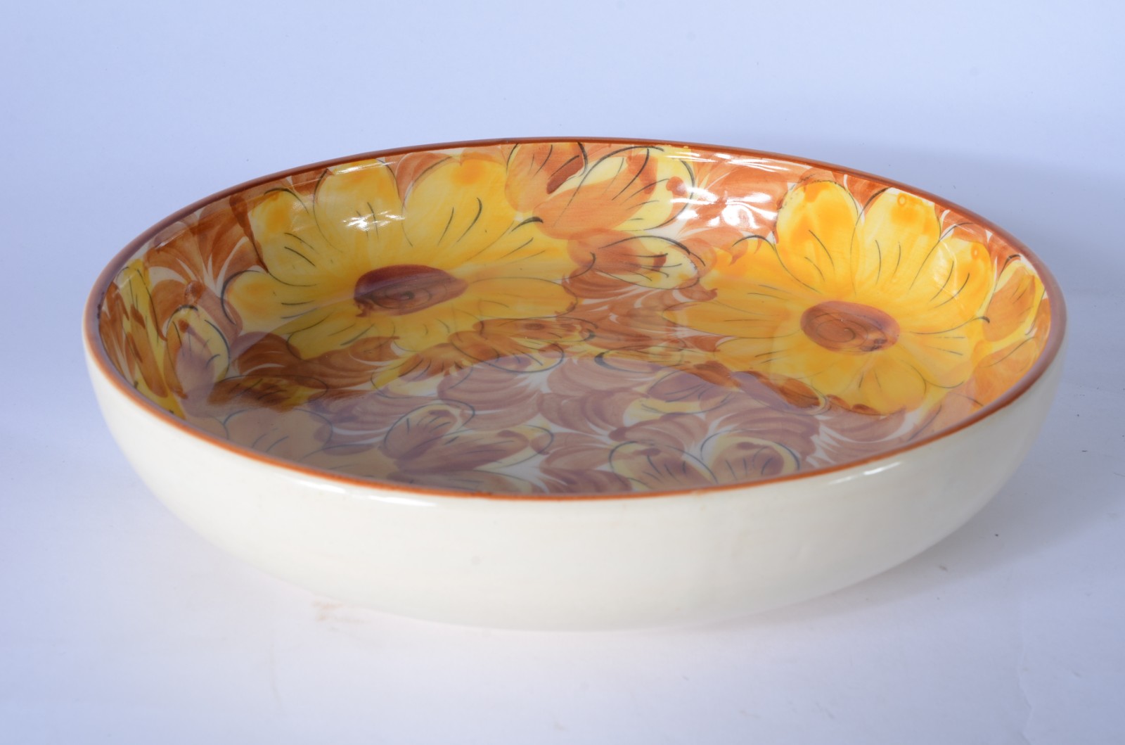 Serviço de chá de cerâmica com flores em tons de amarelo e laranja... - foto 2 de 9