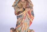 Nossa Senhora da Conceição - Escultura em madeira entalhada com policromia e douração. A figura está representada de pé em vulto perfeito de expressão graciosa com as mãos postas 