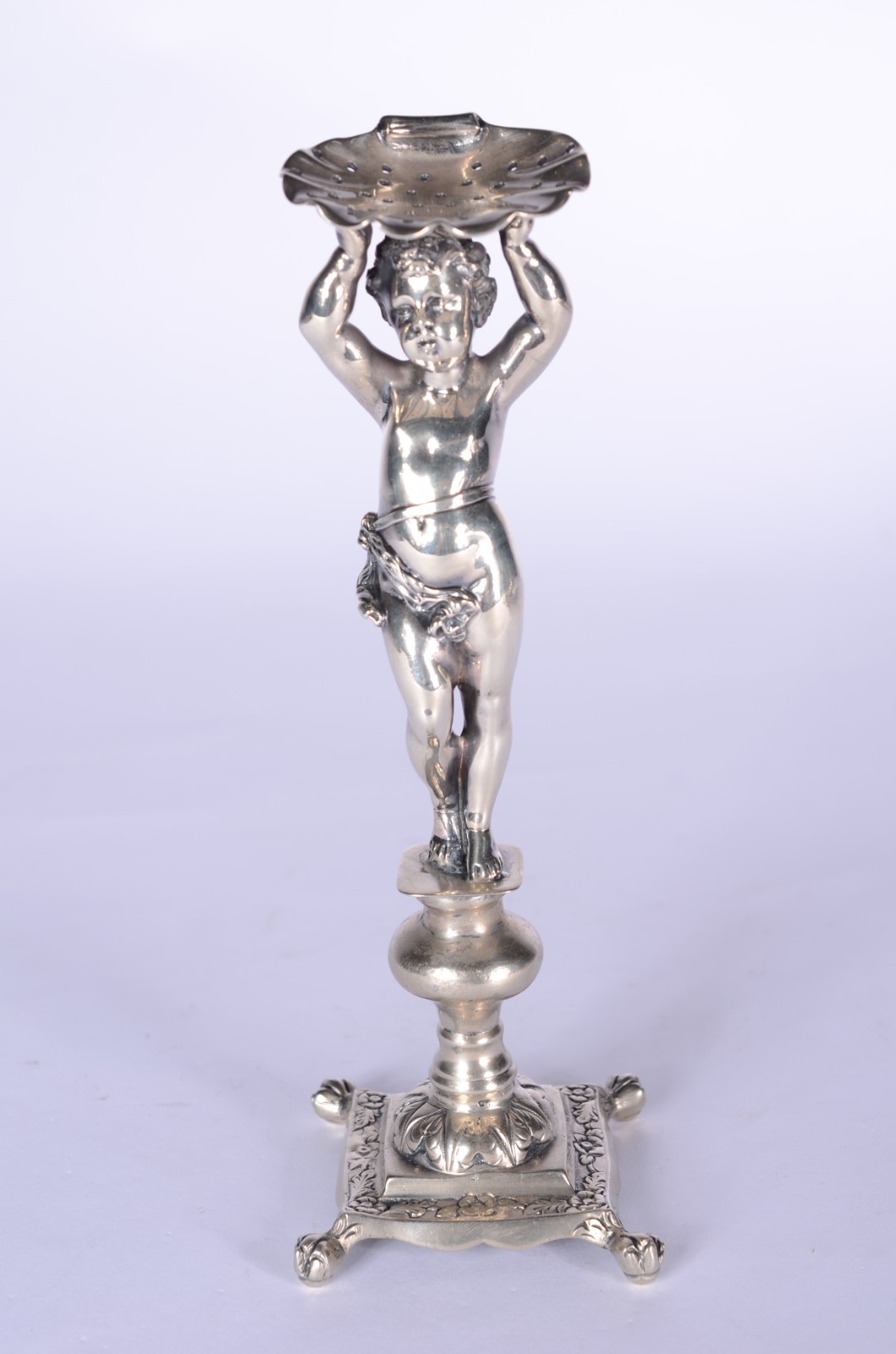 Paliteiro de prata de lei na forma de figura de "pucci" sobre... - foto 1 de 7