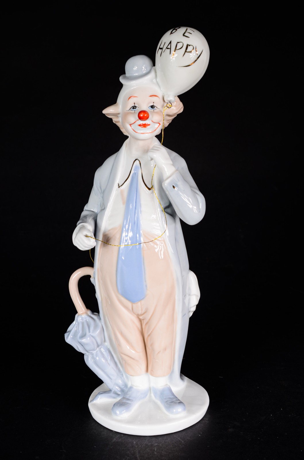 Estatueta de porcelana policromada representando palhaço. - foto 1 de 6