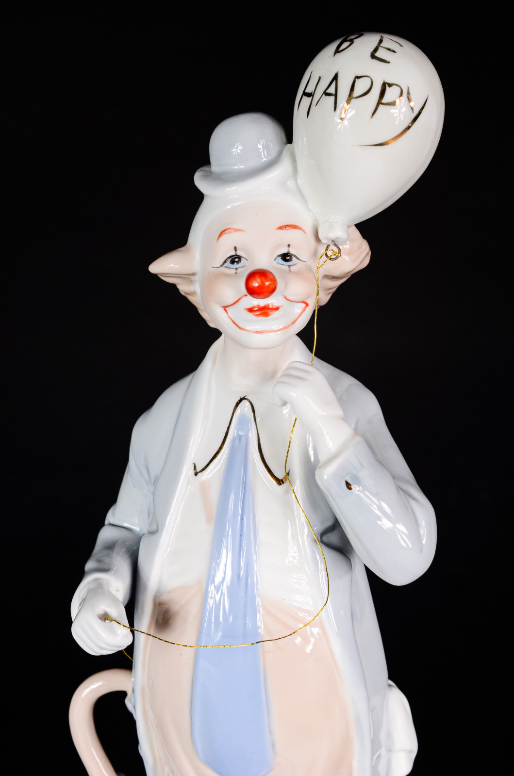 Estatueta de porcelana policromada representando palhaço. - foto 2 de 6