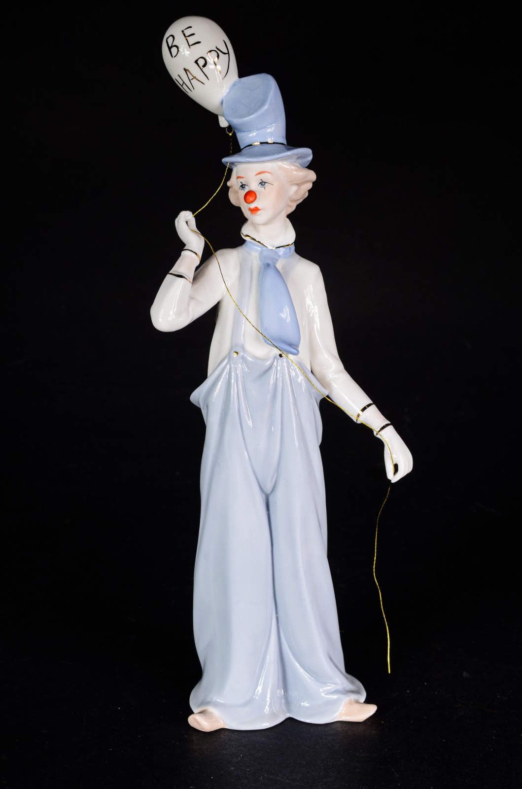 Estatueta de porcelana policromada representando palhaço. - foto 1 de 6