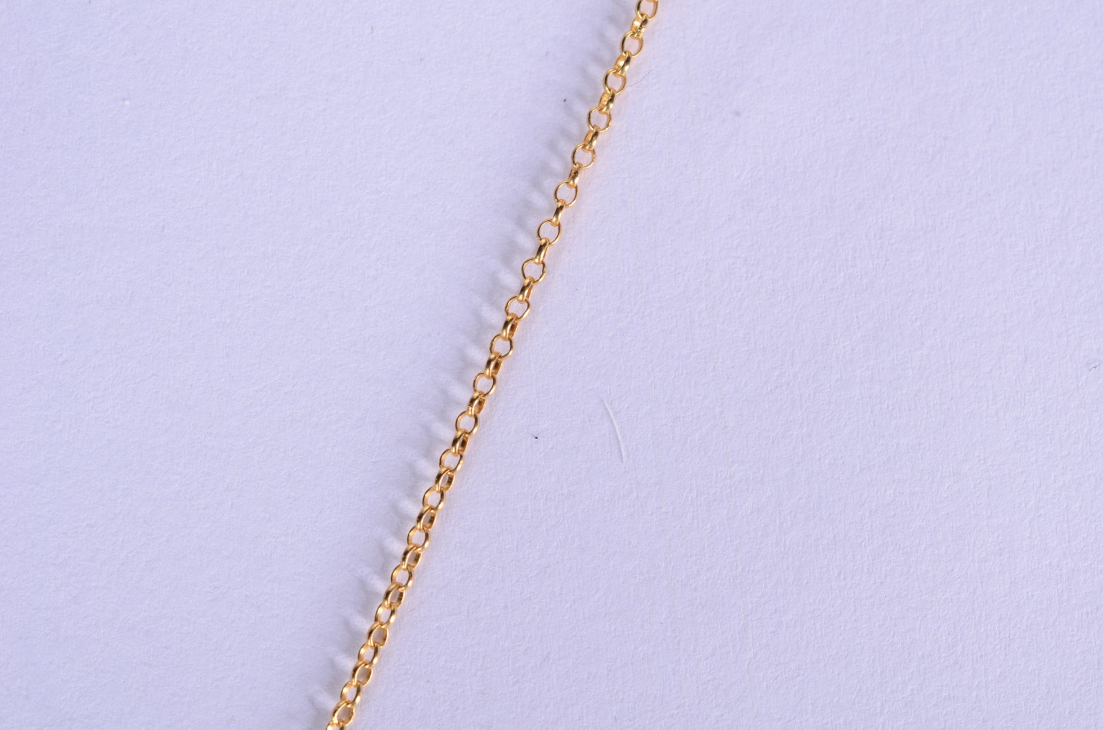 Colar com pendente com figura de Cristo de ouro 18 k., contraste 750... - foto 3 de 6