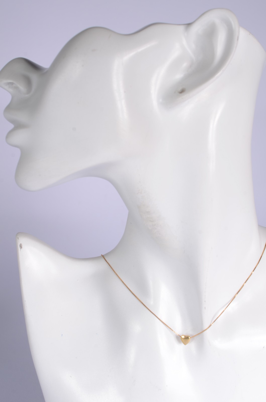 Colar com pendente na forma de coração de ouro 18 k., contraste 750... - foto 6 de 6
