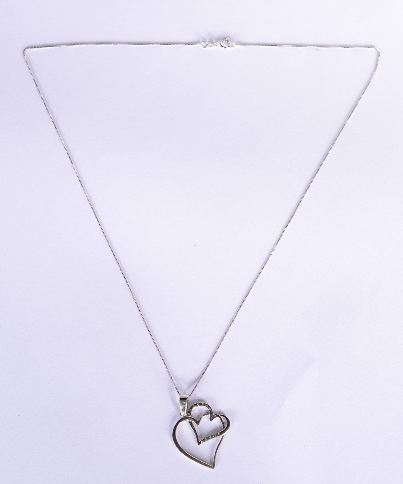 Colar com pendente com coração duplo com brilhante de ouro 18 k. (Por... - foto 2 de 6
