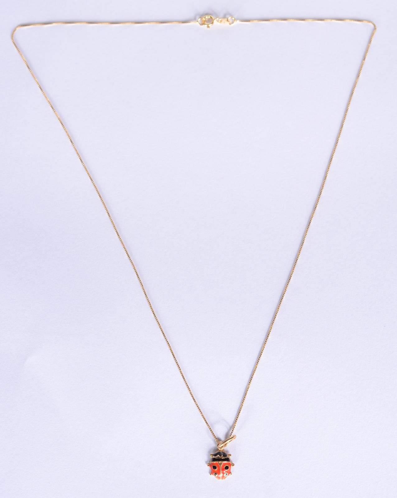 Colar com pendente feitio joaninha de ouro 18 k., contraste 750 mls... - foto 2 de 4