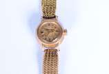 Relógio feminino com pulseira de ouro 18 k., ca... - Relógio feminino com pulseira de ouro 18 k., caixa de metal dourado. (Por motivos de segurança a peça não se encontra na loja).