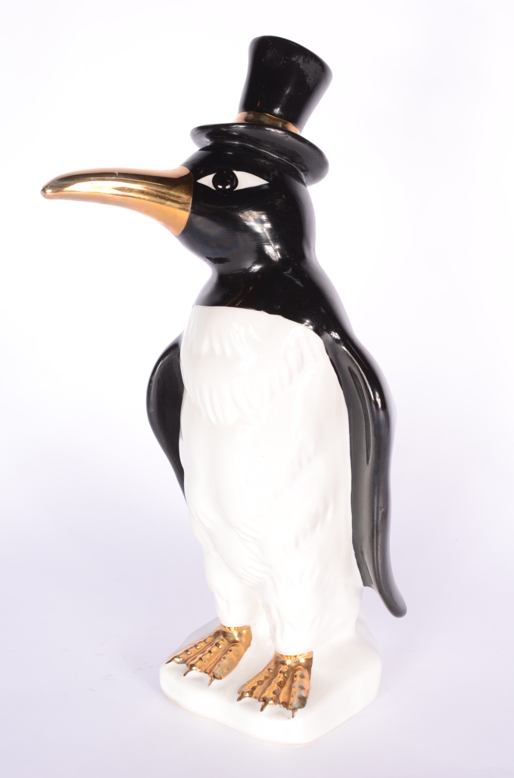 Estatueta de porcelana policromada representando pinguim de cartola. - foto 4 de 7