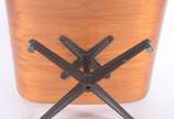 Charles Eames,  - Banqueta em madeira laminada e estofamento de couro preto, base de metal.