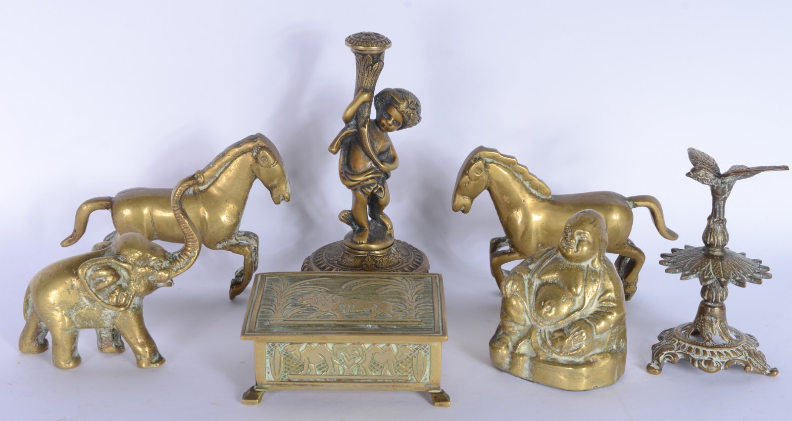 Sete peças diversas de bronze, sendo: par de cavalos; base de... - foto 1 de 7
