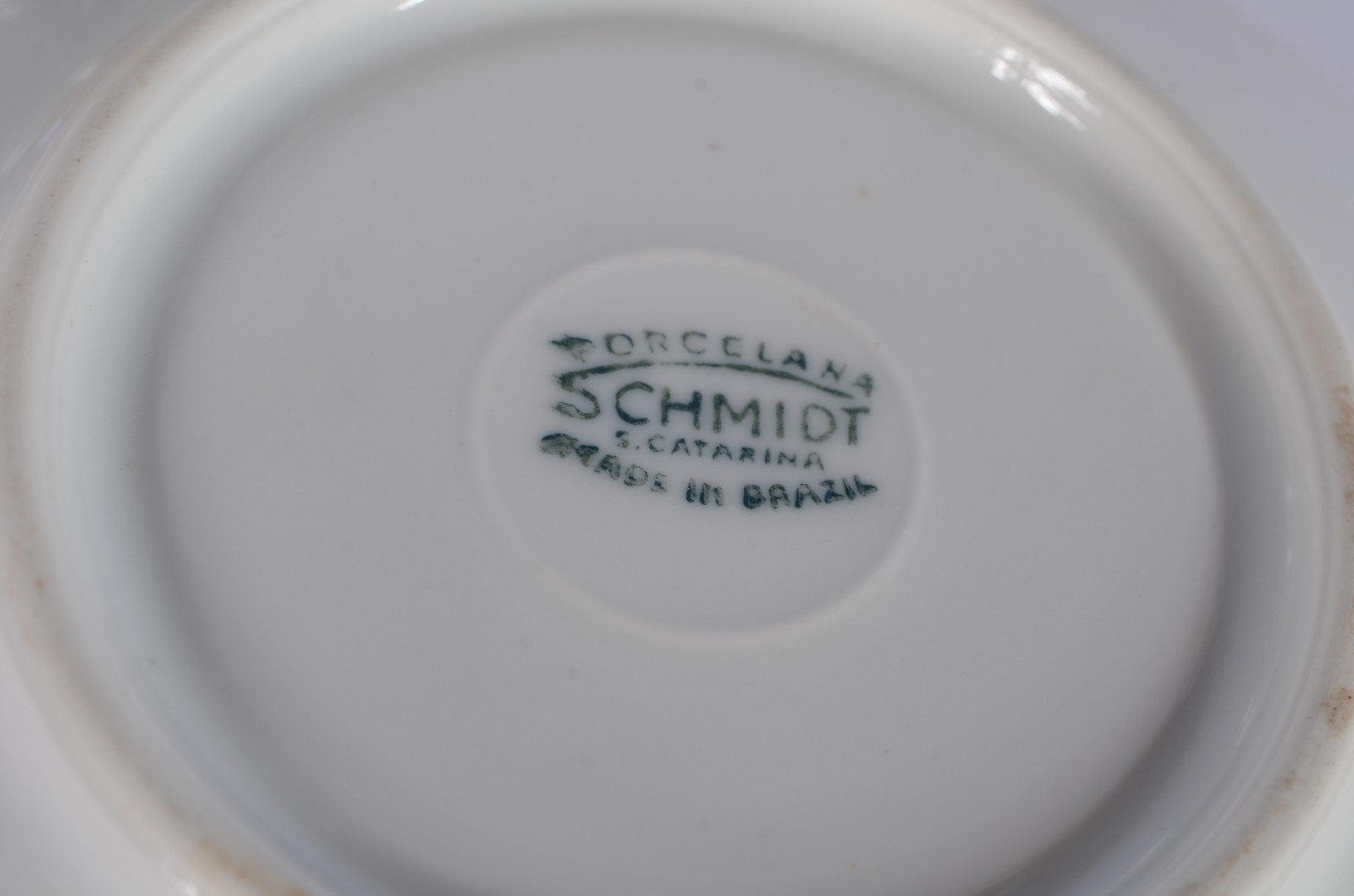 Dois conjuntos para café, sendo: serviço de porcelana Schmidt com... - foto 5 de 6