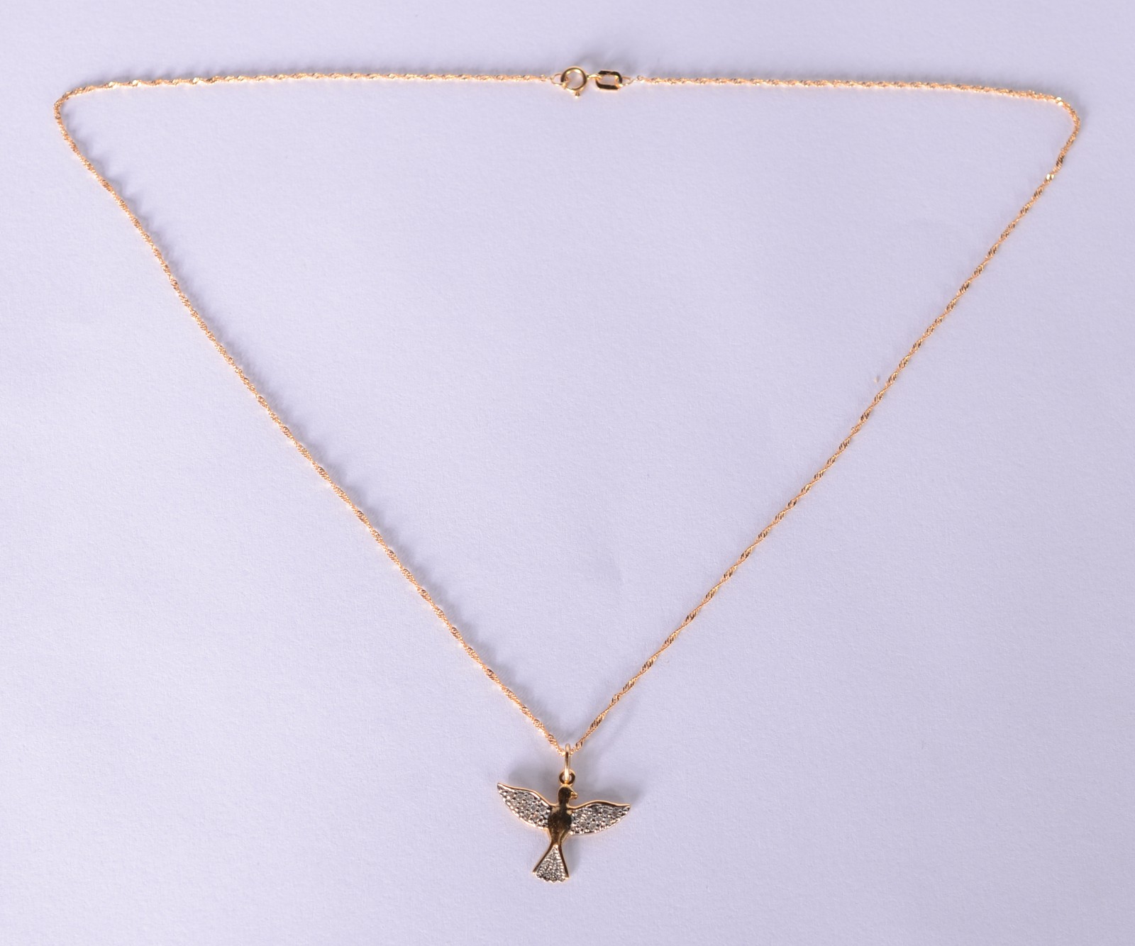 Colar com pendente "Pomba da Paz" de ouro 18 k. (Por motivos de... - foto 2 de 8
