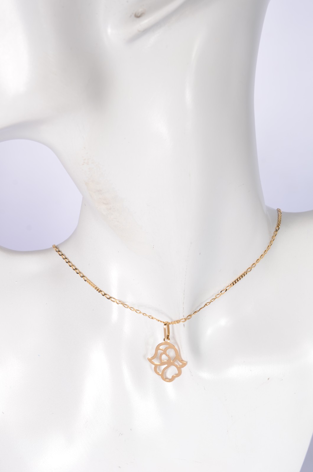 Colar com pendente na forma de mão de Hamsa de ouro 18 k., contraste... - foto 6 de 6