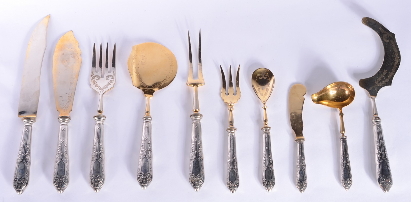 Conjunto com 10 peças para servir de prata com vermeil. Peso total... - foto 1 de 10