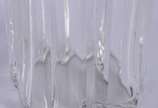 Orrefors (1898-2012),  - Lote com 5 garrafas diversas de cristal, sendo uma de vodka Absolut da marca sueca Orrefors, assinada; uma em bloco na cor lilás; e tres translúcidas,