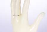 Anel de ouro branco com um brilhante de 0,05 ct... - Anel de ouro branco com um brilhante de 0,05 ct, aro 20. (Por motivos de segurança a peça não se encontra na loja).