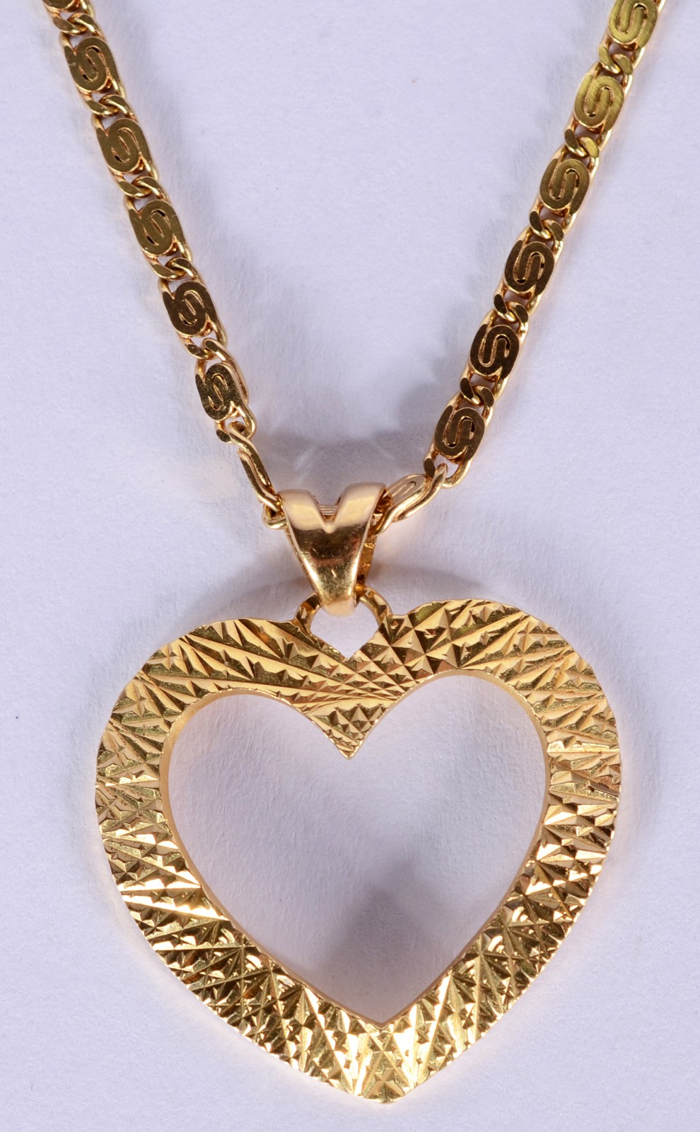 Colar com pendente feitio coração de ouro 18 k., contraste 750 mls... - foto 2 de 7