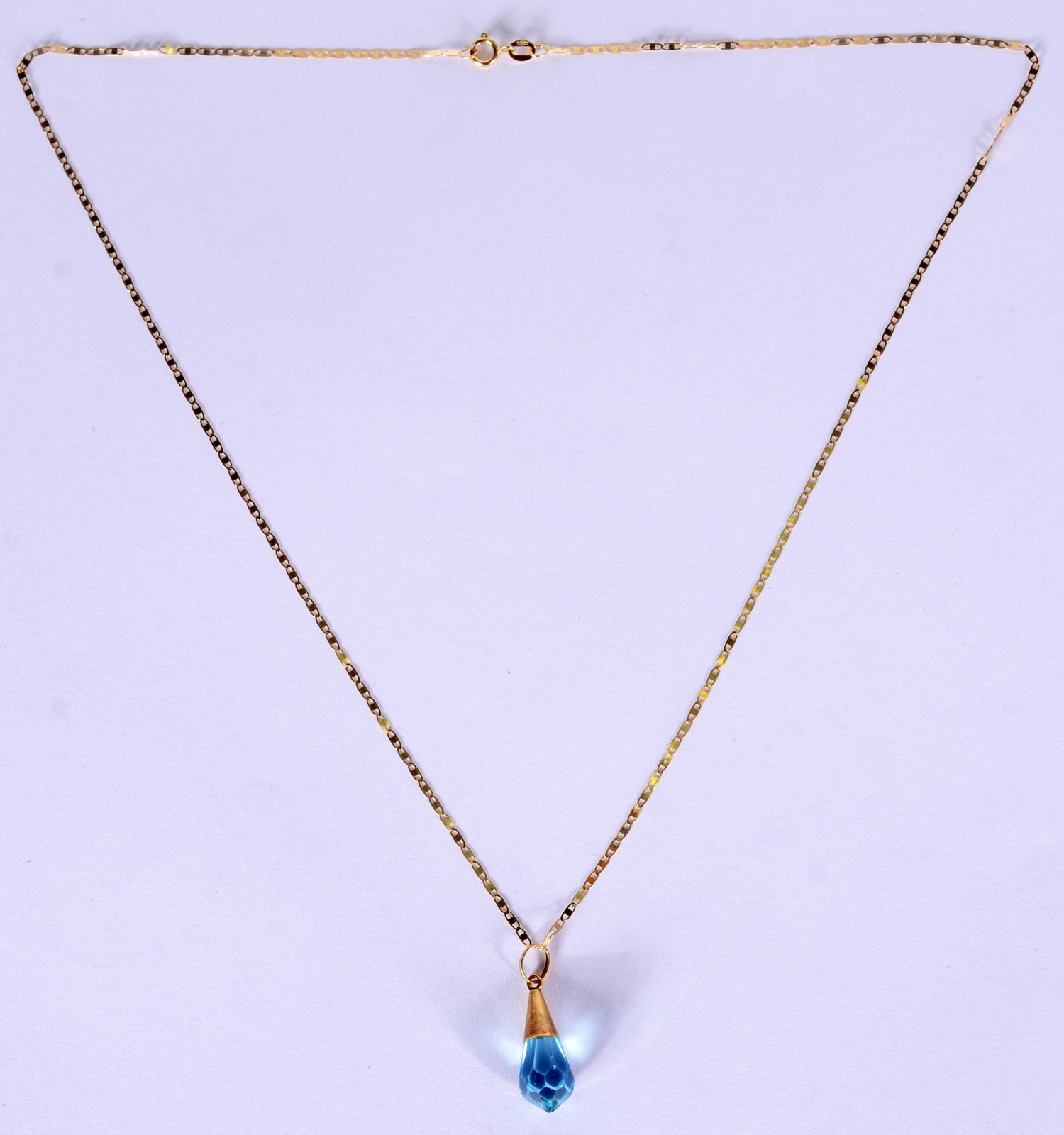 Colar com pendente feitio gota pedra topázio de ouro 18 k., contraste... - foto 1 de 5