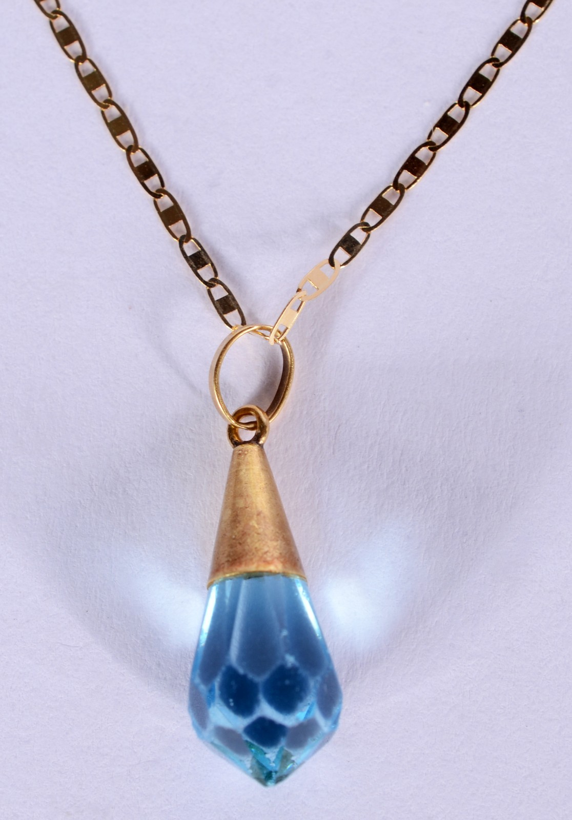 Colar com pendente feitio gota pedra topázio de ouro 18 k., contraste... - foto 2 de 5