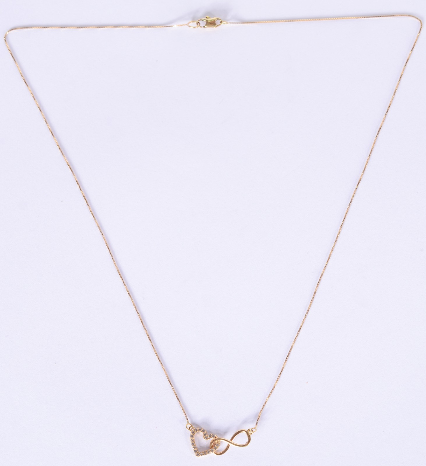 Colar com pendente de ouro 18 k., contraste 750 mls. (Por motivos de... - foto 1 de 6