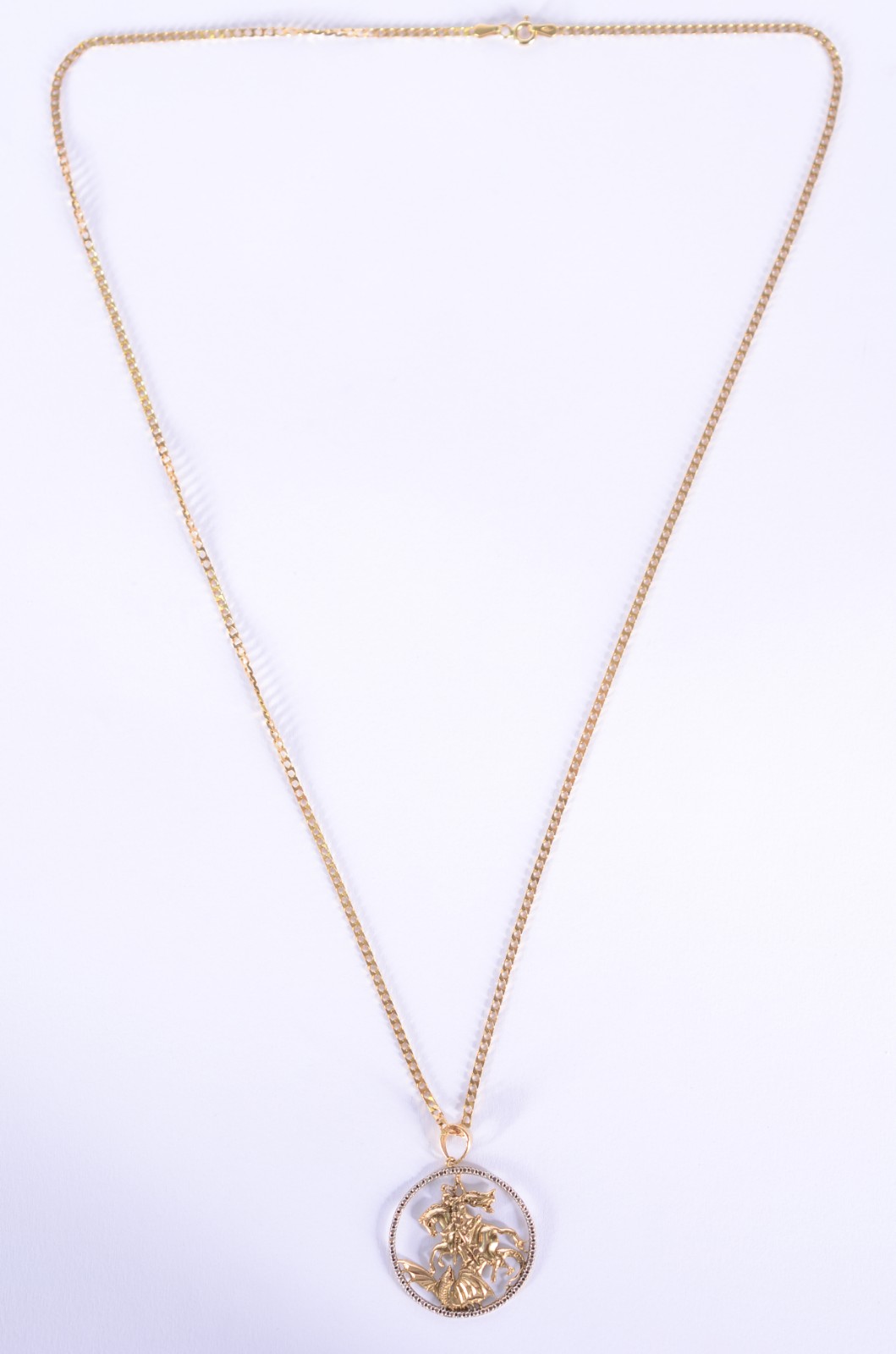 Colar com pendente de São Jorge de ouro 18 k., contraste 750 mls... - foto 1 de 5