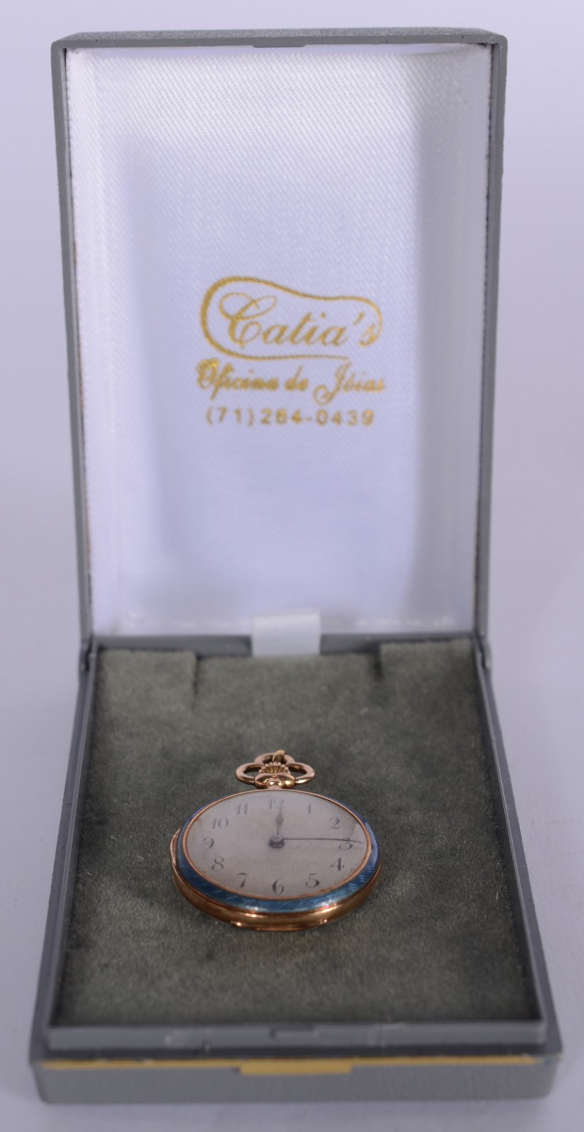 Pequeno relógio de bolso de ouro 14 k., com detalhes em esmalte... - foto 1 de 5