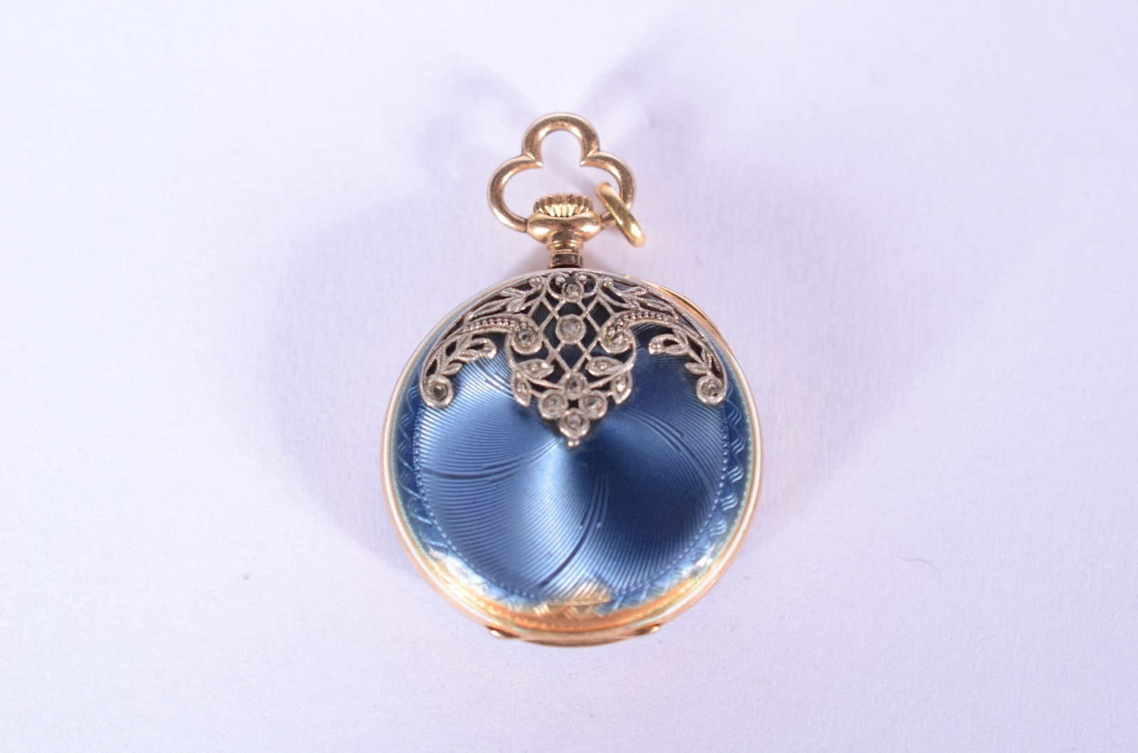 Pequeno relógio de bolso de ouro 14 k., com detalhes em esmalte... - foto 4 de 5