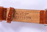 Breitling (1884),  - Relógio de pulso, automático com cronógrafo em aço e ouro.