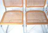 Marcel Breuer (1902-1981),  - Mesa de vidro com base de metal. Acompanham 4 cadeiras “Cesca” com forração em palhinha, design Marcel Breuer  (duas delas com os assentos rasgados).