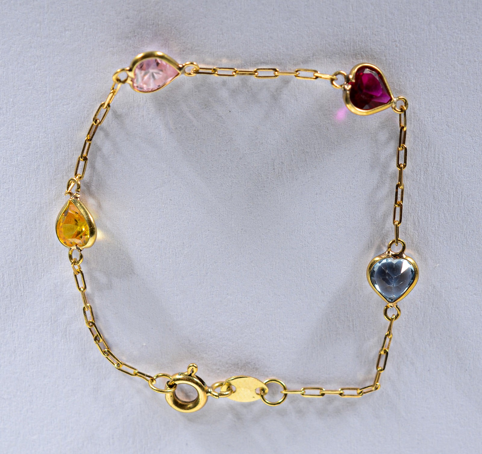 Pulseira de ouro 18 k., contraste 750 mls com pedras coloridas. (Por... - foto 2 de 4