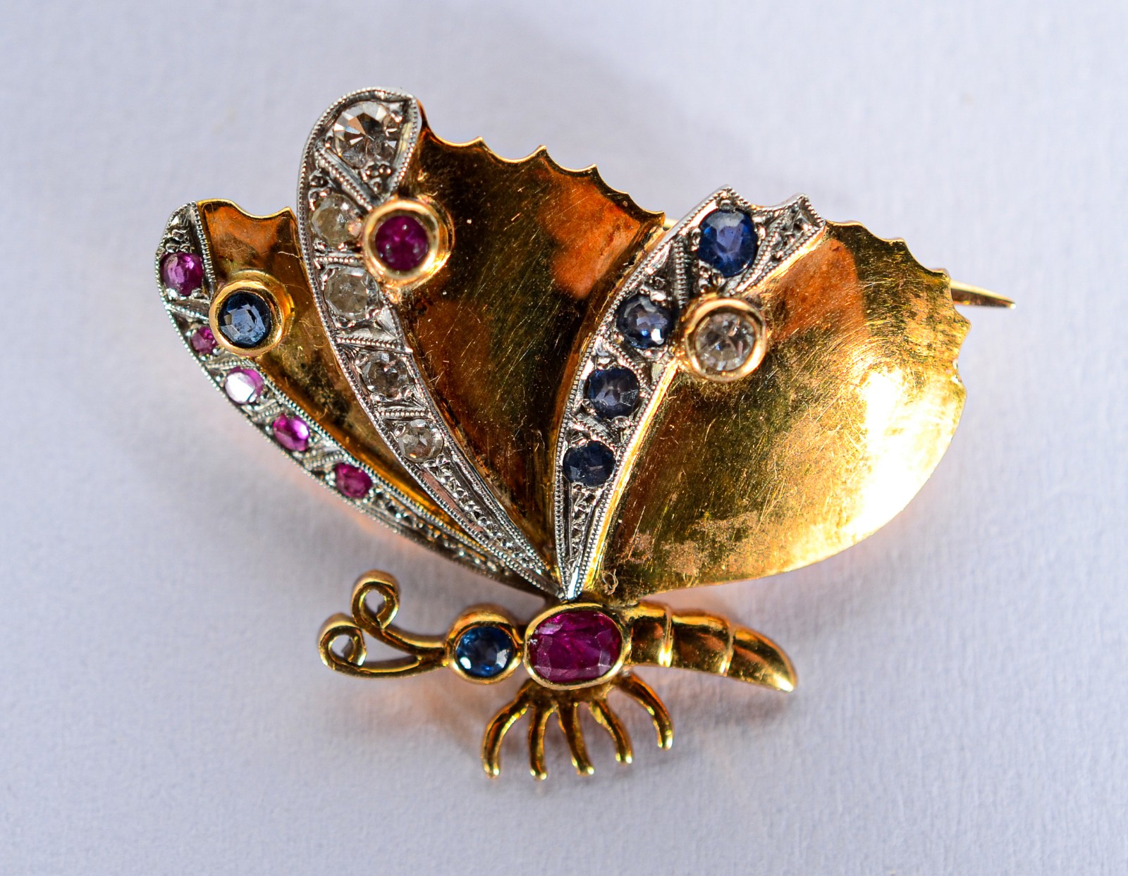 Broche feitio borboleta de ouro 18 k., com pedras brasileiras... - foto 1 de 3