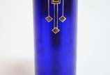 Vaso de vidro azul com detalhes em dourados. - Vaso de vidro azul com detalhes em dourados.