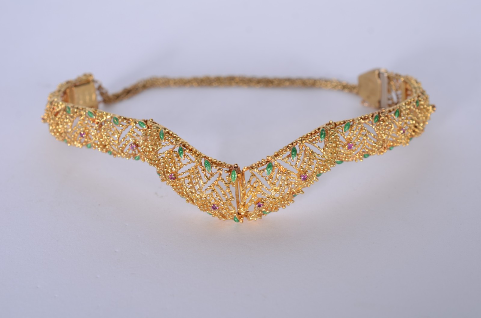 Pulseira de ouro 18 k., pedras na cor lilás. (Por motivos de... - foto 3 de 10