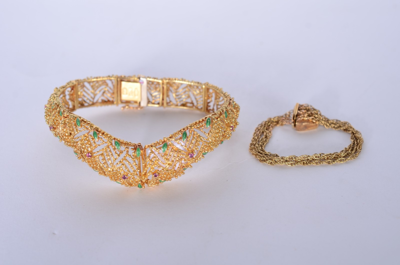 Pulseira de ouro 18 k., pedras na cor lilás. (Por motivos de... - foto 1 de 10