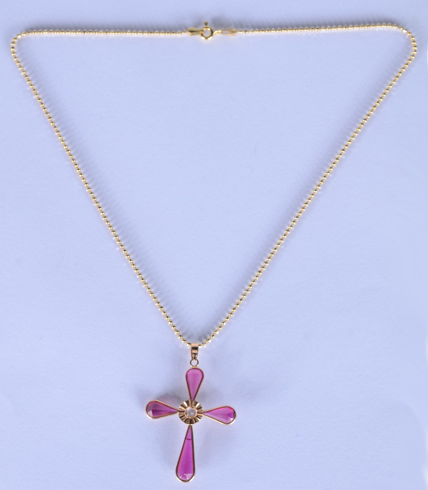Colar de ouro 18 k., contraste 750 mls com cruz com pedras vermelhas... - foto 2 de 6