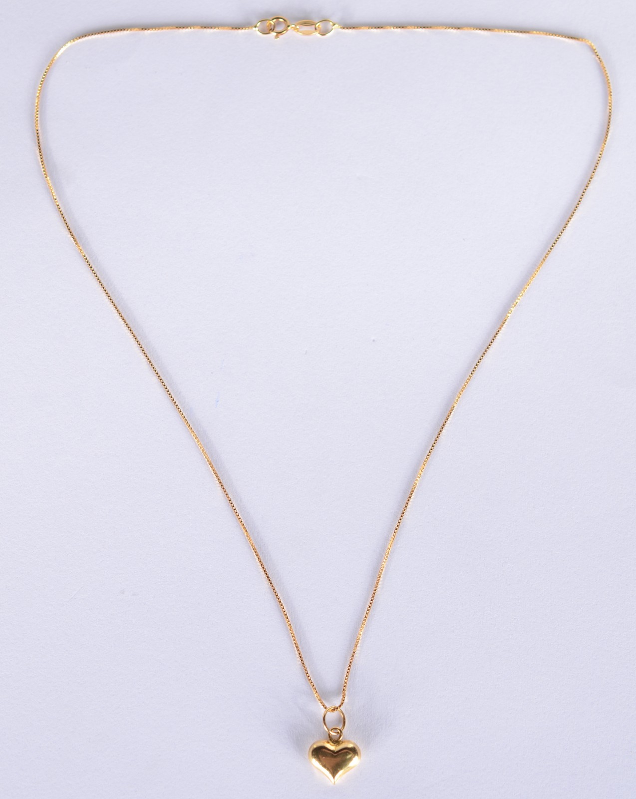 Colar de ouro 18 k., contraste 750 mls com um pendente feitio... - foto 2 de 5