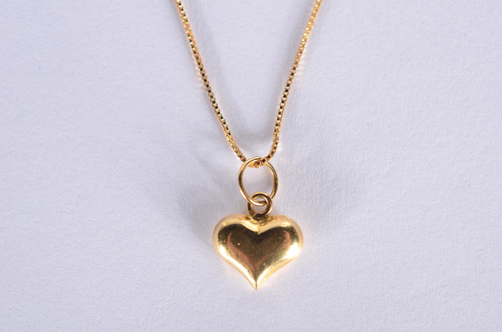 Colar de ouro 18 k., contraste 750 mls com um pendente feitio... - foto 1 de 5