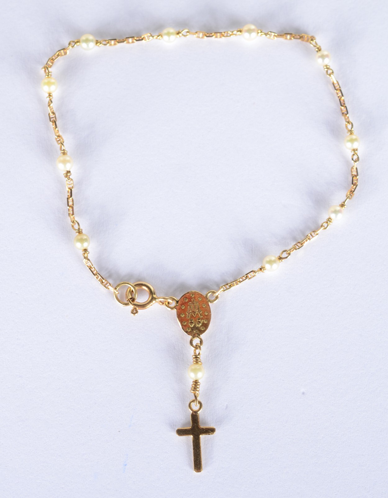 Pulseira de ouro 18 k., contraste 750 mls com perolas e cruz. (Por... - foto 2 de 6